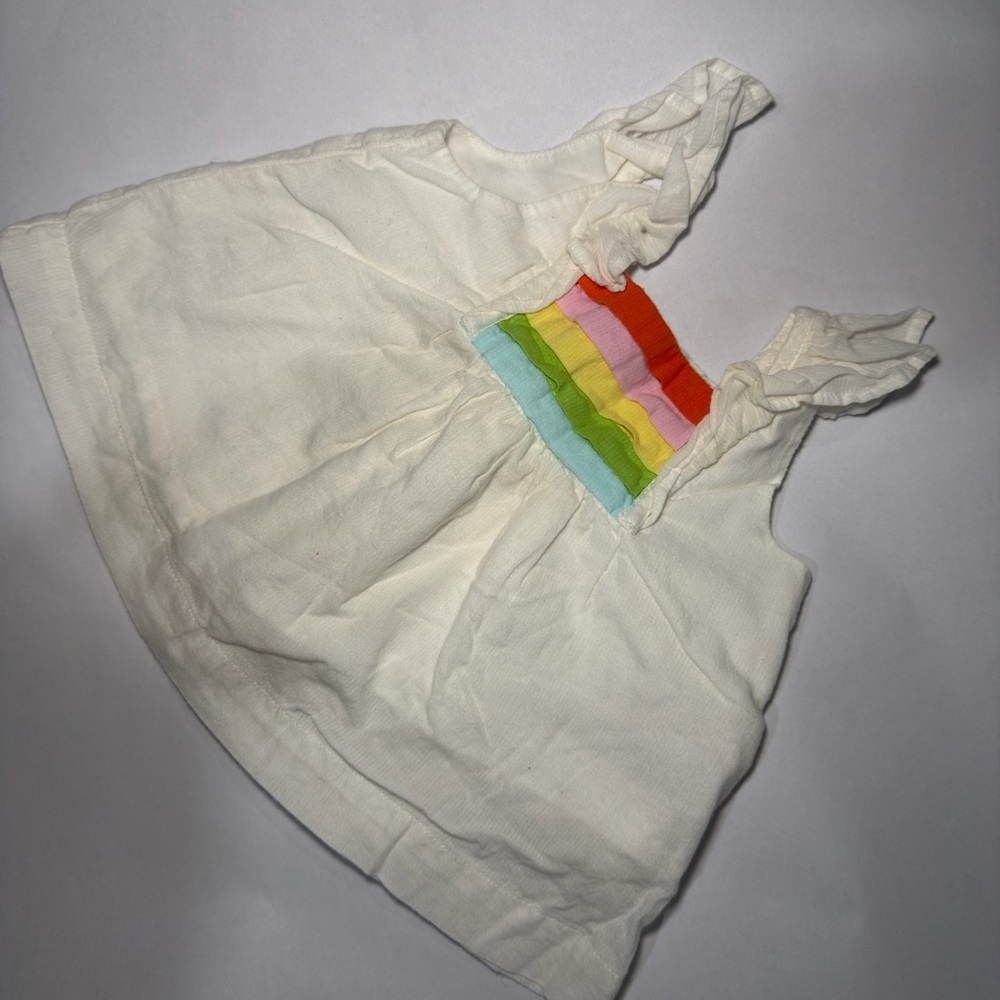 Cream Sleeveless Baby Top with Rainbow Ruffle Detail